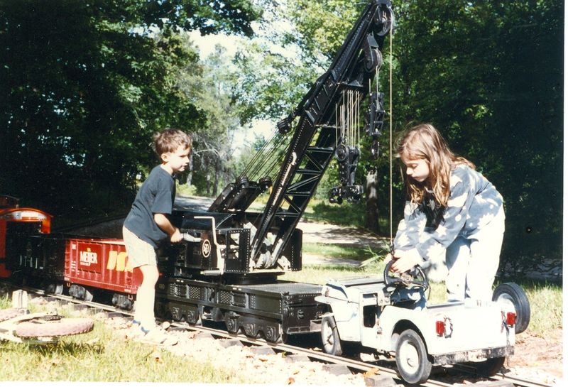 Wrecking crew removes stalled Jeep from rail line