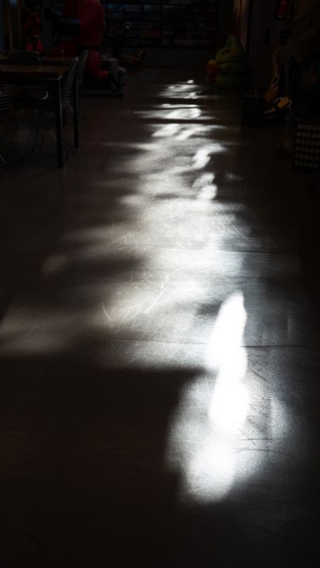 Speckled Light on the Floor at the Office