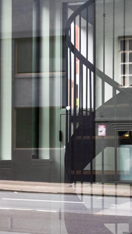 Spiral Staircase Window Reflection