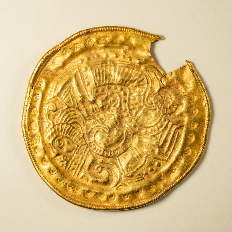 Migration Age iconography on a late 5th-early 6th century Anglian bracteate (IK584), published Behr (2010)