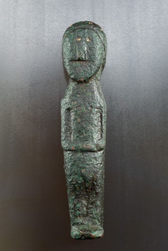 Amuletic male figurine (fertility deity), ca early 7th C, 51 mm, from Friston, Suffolk