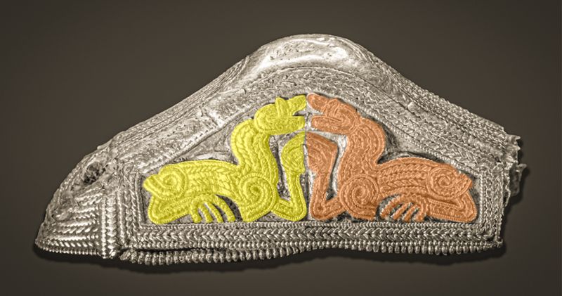 Salin Style II filigree confronting beast design on a gold sword pommel