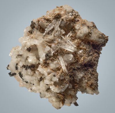Epididymite (colourless) with elpidite (brown) crystals on albite, Narssarssuk, Igaliko, Greenland, Type Locality for both