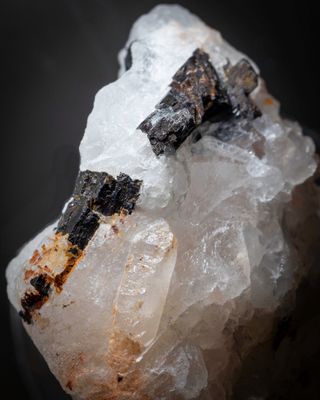 Quartz crystals in cryolite with siderite and chalcopyrite, Ivigtut
