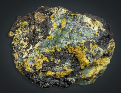 Crystalline plumbogummite with yellow mimetite crystals and manganese oxides, Drygill Mine, Caldbeck Fells