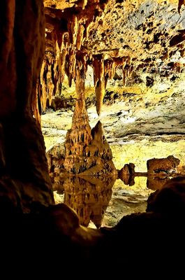 Stalagtites, stalagmites and an underground pool