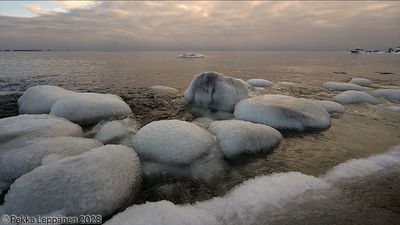 Frozen rocks by the sea