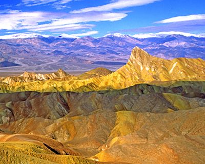 Zabriskie Point  in dappled light, Death Valley National Park, CA