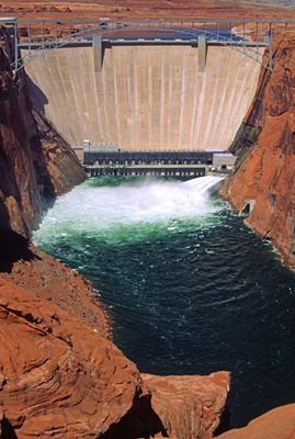 Glen Canyon Dam releasing water in an attempt to restore the Grand Canyon to some semblemce of its original characteristics. 