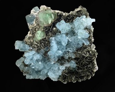 Blue and Green Crystals of Beryl on Muscovite