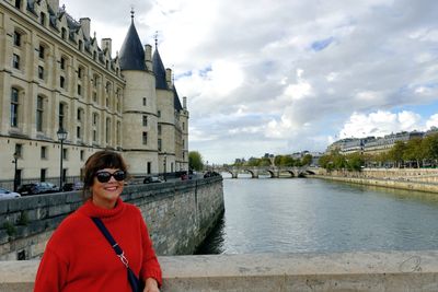 Nikki on the Pont au Change with the Conciergerie in the background