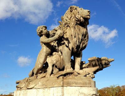 Alexander III Bridge - Lion with Boy Statue