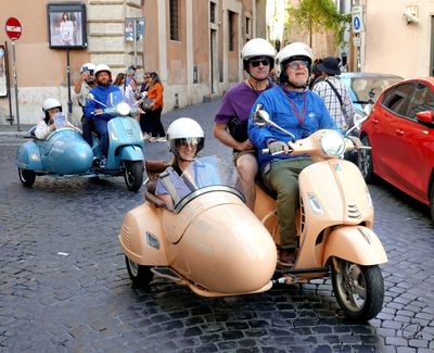 Vespa sidecar tourists, Rome