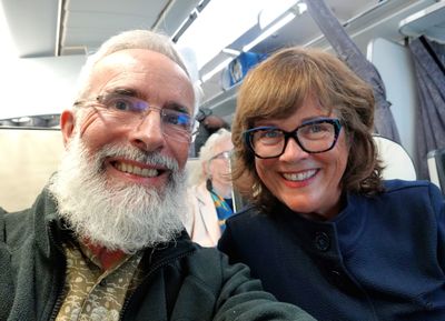 Nikki and Phil on plane to Paris