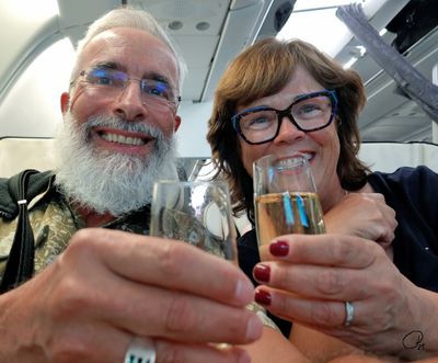 Champagne on the plane to Paris
