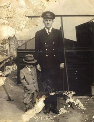 Year 1943 My father and Nestor Junior me. / Lower Manhattan rooftop
