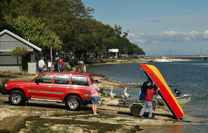 Putting the small boat in the water