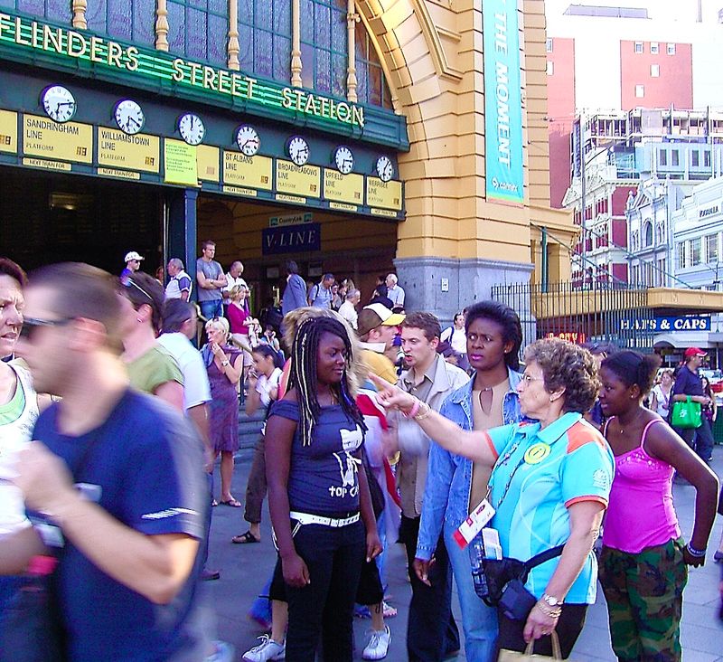 Member of Volunteers Program guiding visiting athletes and tourists around
