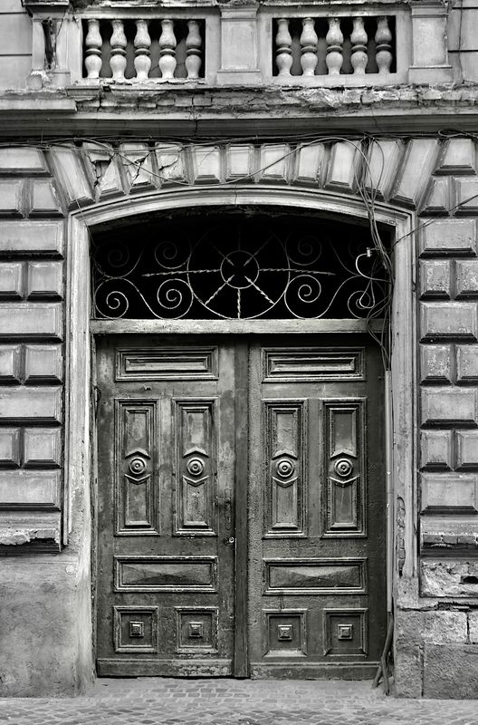 a by gone era building - gate - in need of a tender loving care