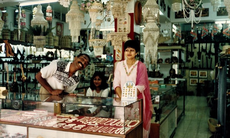 smiling wide - succesful shop owners