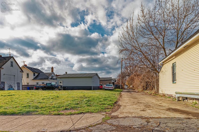 W.34th St. + Berne Ct.