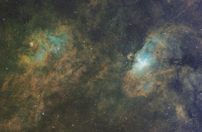 Eagle Nebula (right) and sorrounding dust clouds