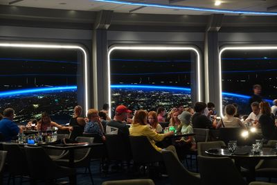 Space 220 Restaurant - nighttime on Earth
