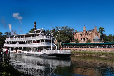 Liberty Belle passing the Haunted Mansion