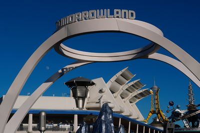 Tomorrowland entrance and daytime moon