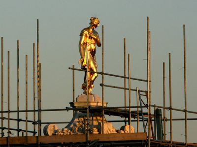 The refurbished statue has been replaced.