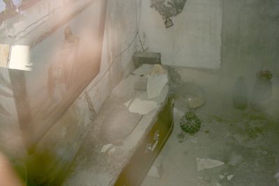 Coffin on the left looking through the window