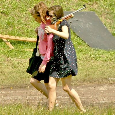 Most schoolgirls carry a bag or a phone