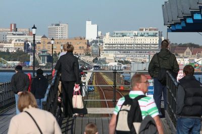 People waiting for the train to go back to the promenade