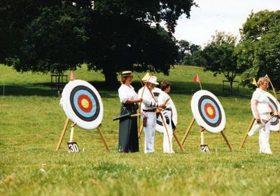 Barbara and her husband shooting in an English Long Bow Competition at Dunster
