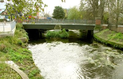 The bridge goes into Garatt Lane on the left