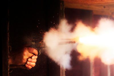 Peter firing a black powder pistol