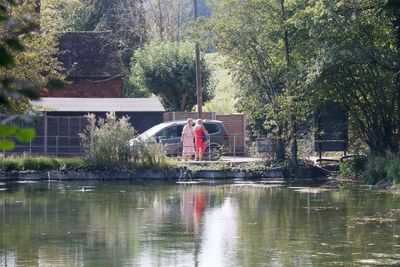 The farm is left on the road at the bottom of the pond
