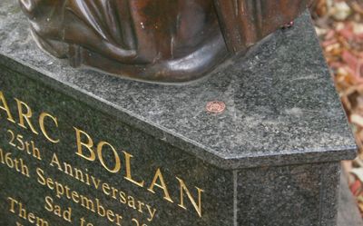 It has become a habit in England to leave a coin on Headstones. Sadly someone else is taking the coins