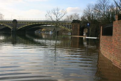 Very high tide, the river has flowed up Old Palace Lane on the right