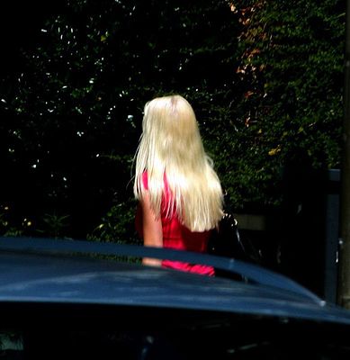Blonde walking by, shame that car got in the way