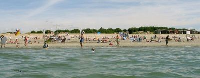The sea is shallow and a sandy bottom