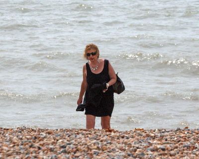 Rather over dressed for the beach, each to their own