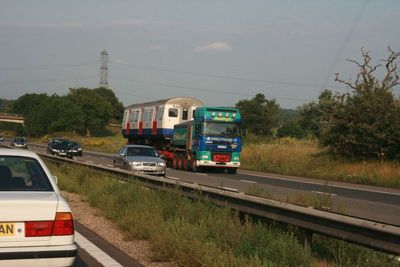 Trains look big on the track, not so big on the back of a lorry