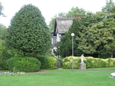 House at bridge end of park