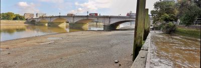 A very low tide, very muddy slipway