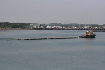 Tug towing a floating platform