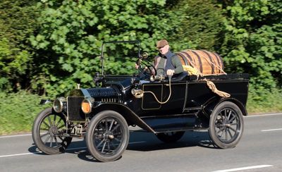 Possibly a Ford, converted to carry liquids