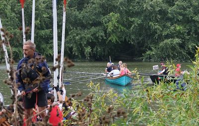 A lot of boats have to wait for room to retrieve their boat from the river.