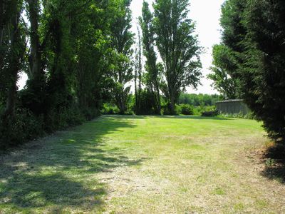 Back field, A totally wasted space, would make a good car park.