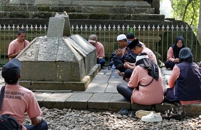 Praying at Tomb of Embah Dalem Arief Muhammed